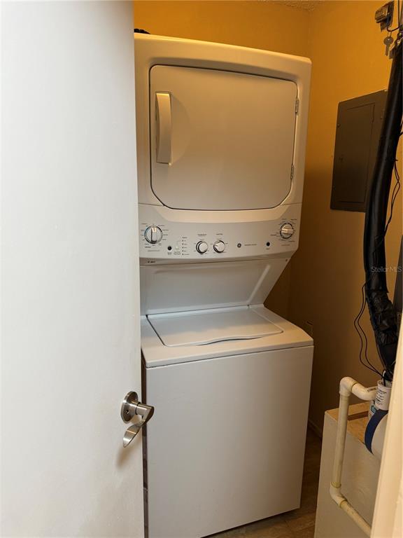 13250 Ridge Road, Unit 16 Largo, FL 33778 - Photo 28 of 36 a utility room with dryer and washer