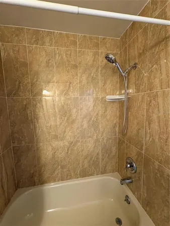 an empty room with wooden floor