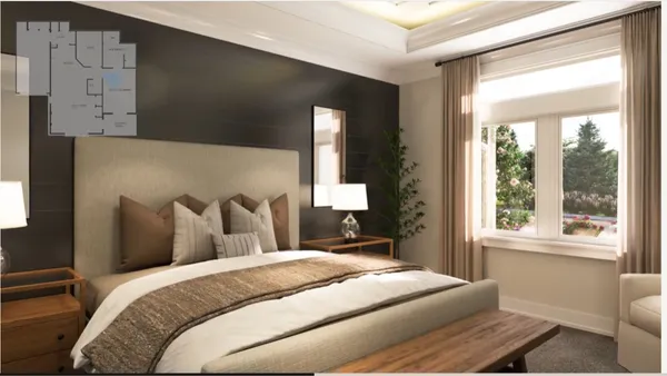 a bedroom with a large bed and a large window