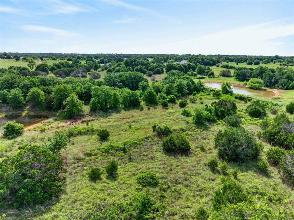 Lot 28 Fairview Road Mineral Wells, TX 76067 - Photo 12 of 16 a view of a green field