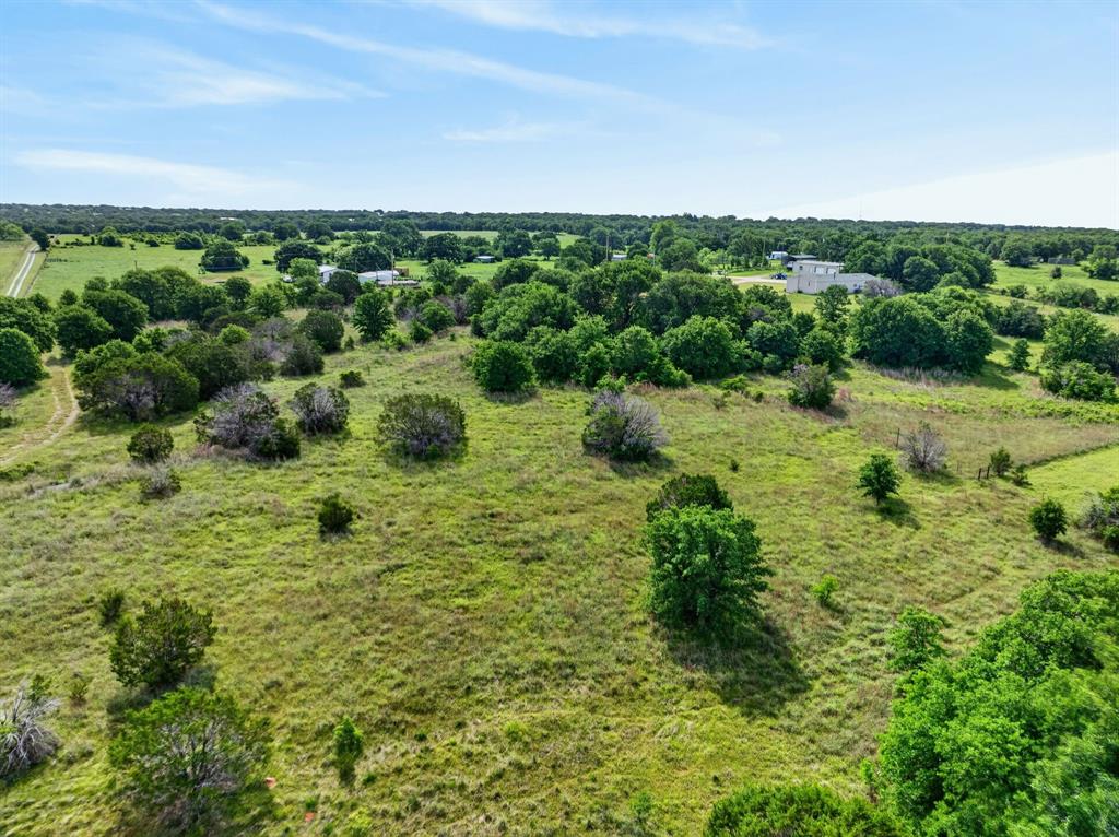 Lot 28 Fairview Road Mineral Wells, TX 76067 - Photo 13 of 16 a view of a big yard with large trees