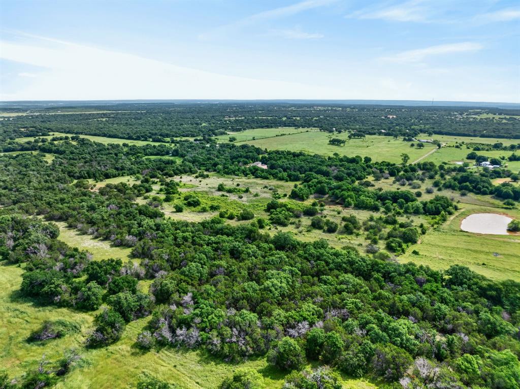 Lot 28 Fairview Road Mineral Wells, TX 76067 - Photo 6 of 16 an aerial view of a house with a yard