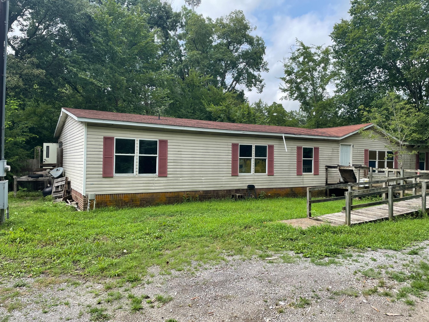 165 Bunker Hill Road Rockvale, TN 37153 - Photo 2 of 8 a view of a house with backyard and a tree