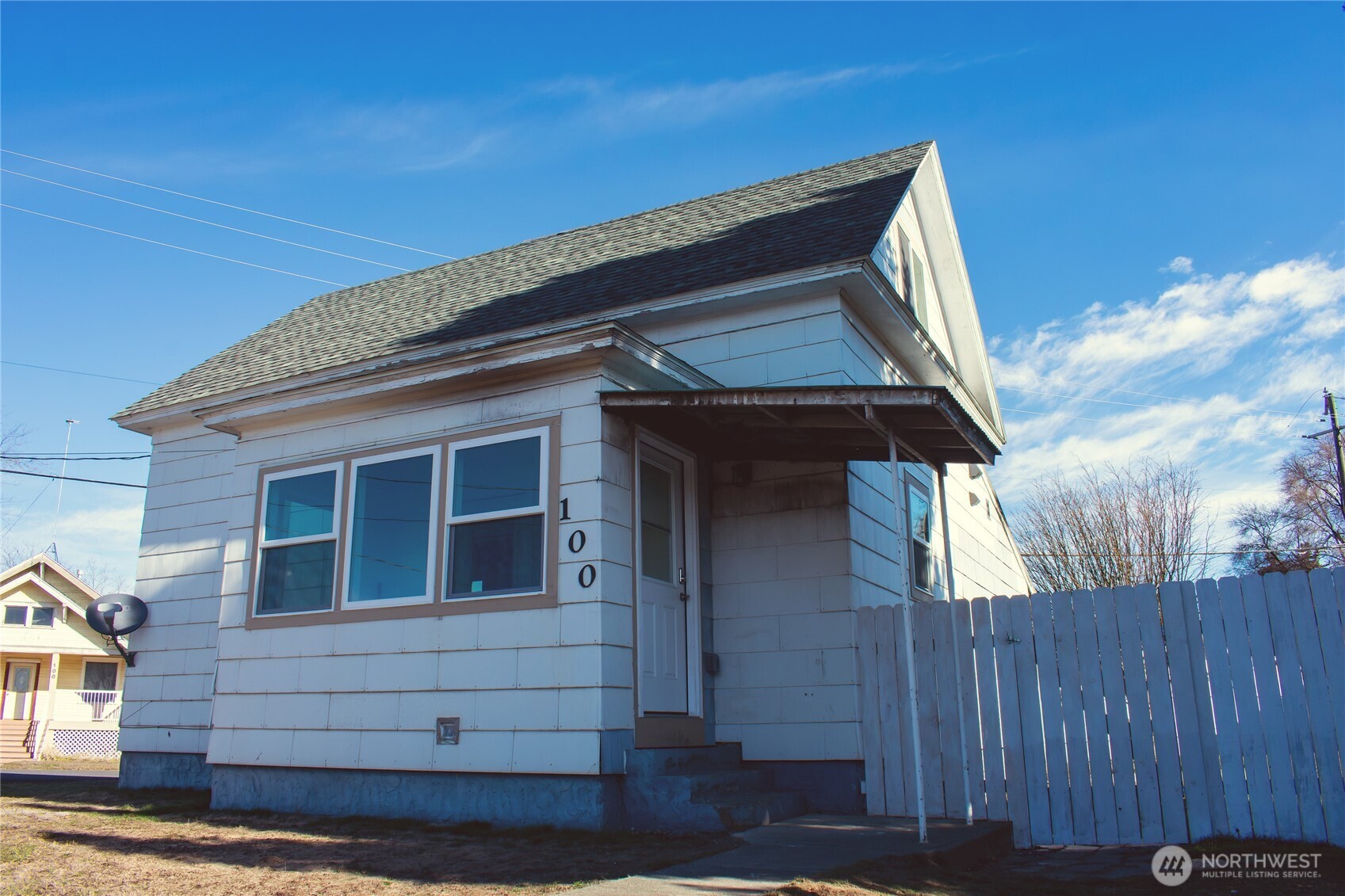 100 D Street Endicott, WA 99125 - Photo 15 of 18 a front view of a house with a garage