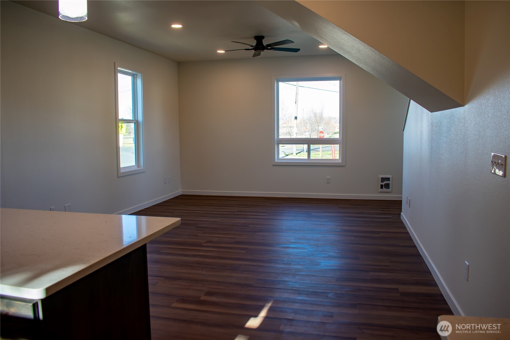 100 D Street Endicott, WA 99125 - Photo 6 of 18 wooden floor in an empty room with a window