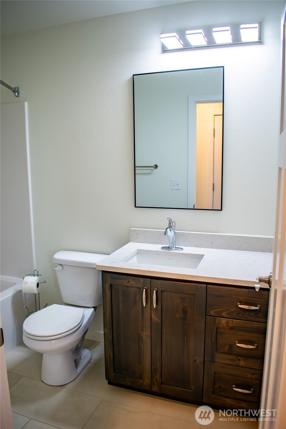 100 D Street Endicott, WA 99125 - Photo 10 of 18 a bathroom with a toilet sink and mirror