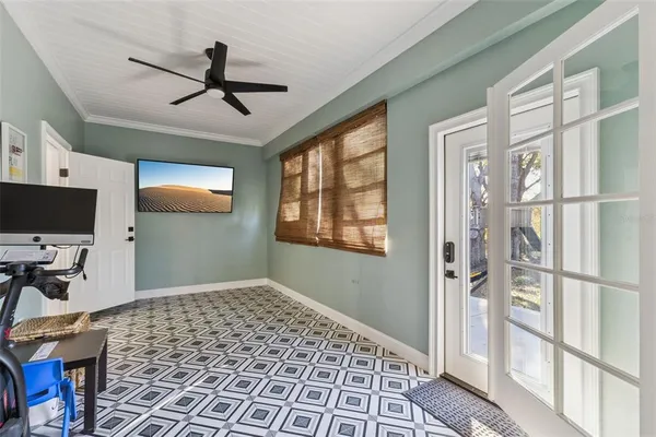 a view of a livingroom with furniture and a window