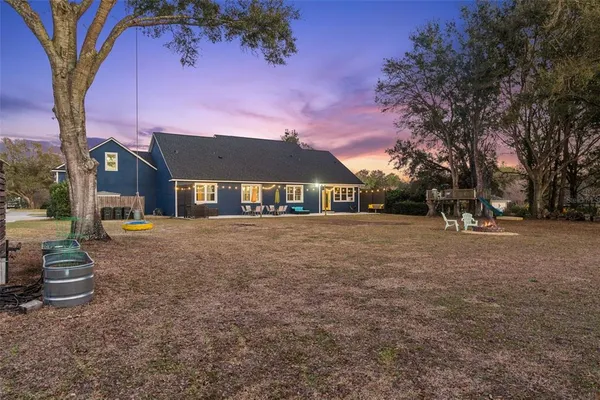 a table and chairs in front of house