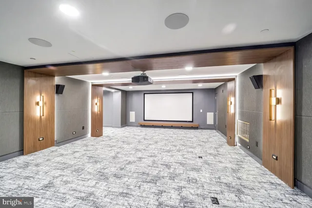 a front view of a building with a yard