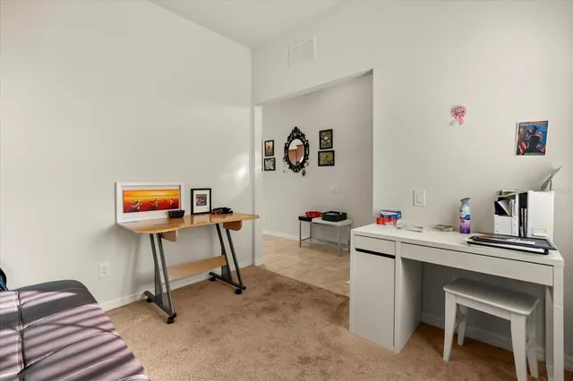 a workspace with furniture and window