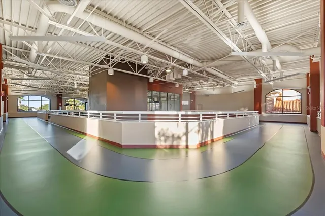 a view of a swimming pool with a yard