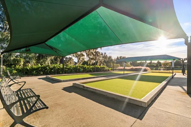 a view of swimming pool with chairs