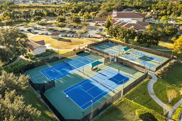 an aerial view of a pool patio patio and outdoor seating