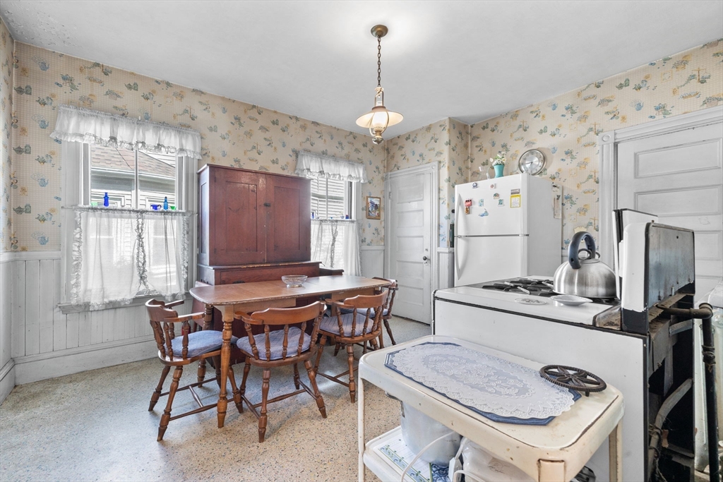 44 Walnut Street Everett, MA 02149 - Photo 16 of 38 a dining room with furniture and window