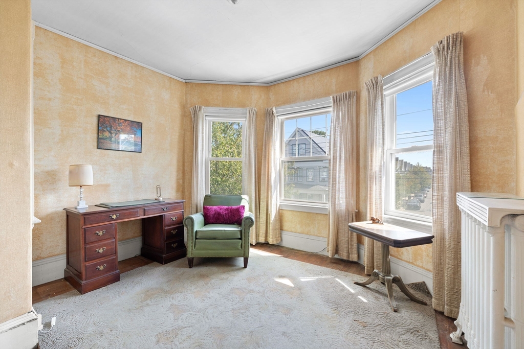 44 Walnut Street Everett, MA 02149 - Photo 25 of 38 a view of a livingroom with workspace and a window