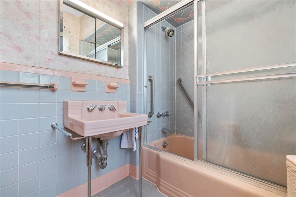 44 Walnut Street Everett, MA 02149 - Photo 29 of 38 a bathroom with a bath tub and a shower