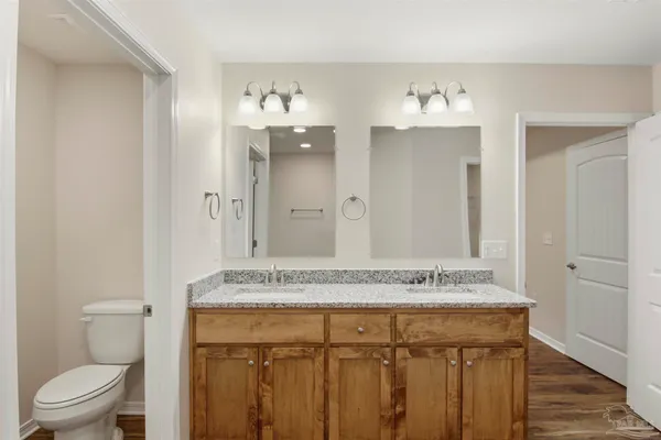 a bathroom with a shower and a bath tub