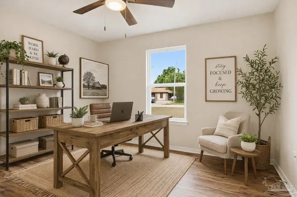 a kitchen with stainless steel appliances kitchen island granite countertop a table chairs refrigerator and microwave