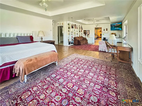 a bed room with a bed and a couch