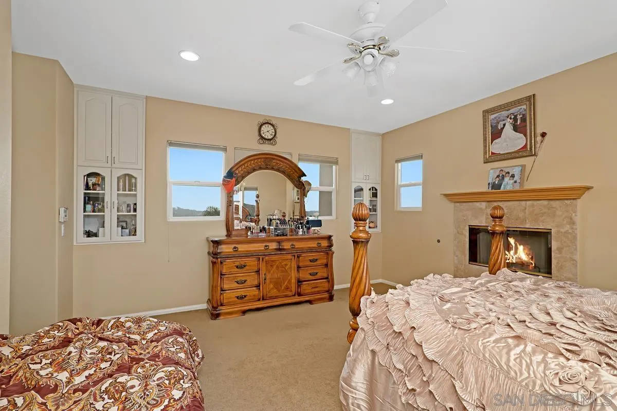 1707 Horizon Heights Circle El Cajon, CA 92019 - Photo 11 of 26 a bedroom with a bed and a dresser