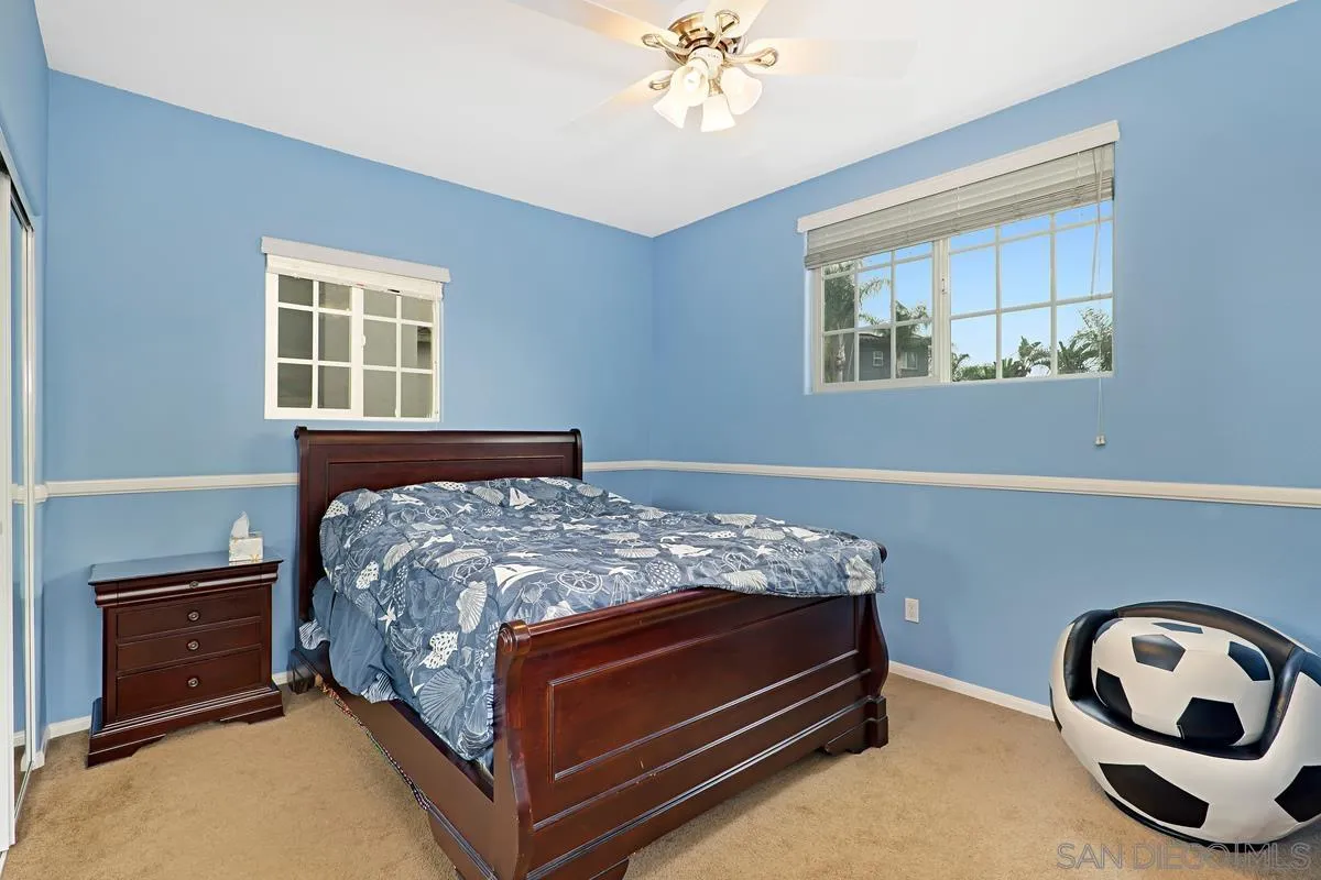 1707 Horizon Heights Circle El Cajon, CA 92019 - Photo 14 of 26 a bed sitting in a bedroom next to a window