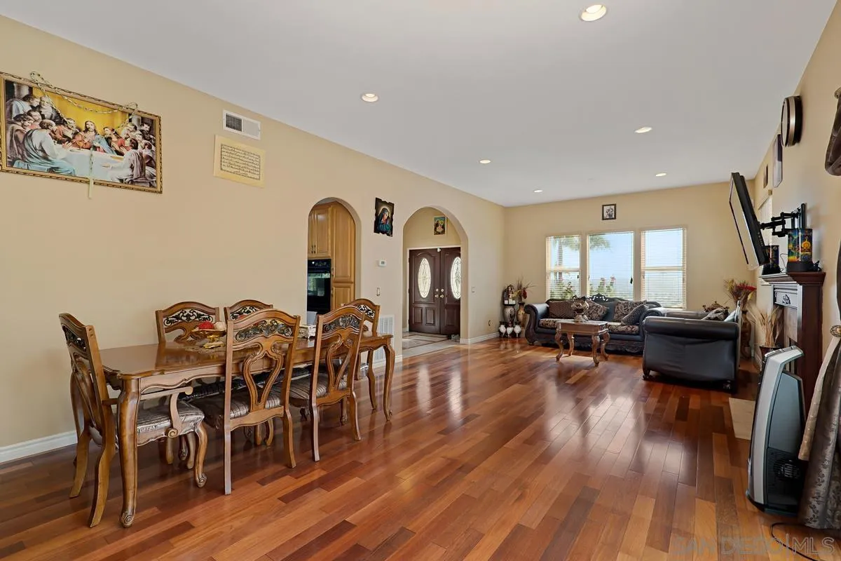 1707 Horizon Heights Circle El Cajon, CA 92019 - Photo 3 of 26 a view of a dining room with furniture and wooden floor