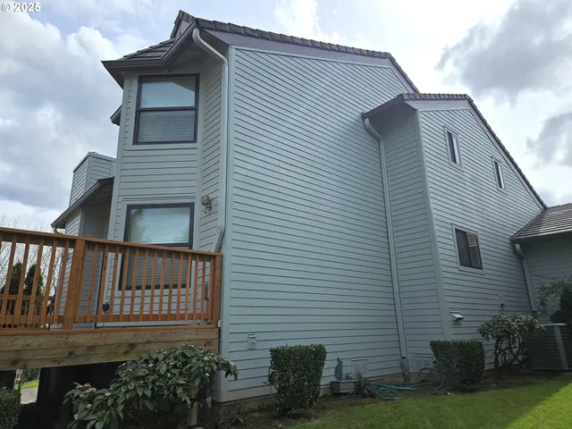 a view of a balcony with a garden