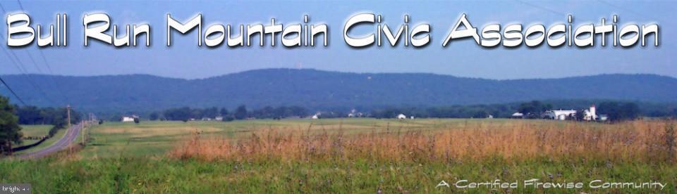 2613 Lookout Road Haymarket, VA 20169 - Photo 3 of 14 a view of a lake with a mountain in the background and a lake view