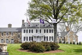 2613 Lookout Road Haymarket, VA 20169 - Photo 8 of 14 a front view of a building with garden