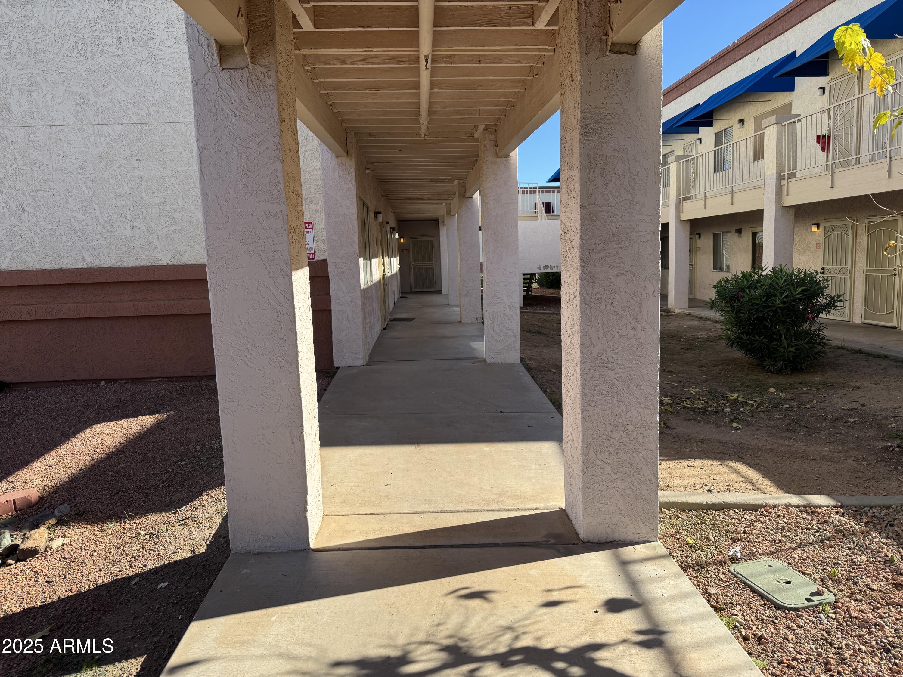 12123 West Bell Road, Unit 164 Surprise, AZ 85378 - Photo 2 of 6 a view of a porch of the house
