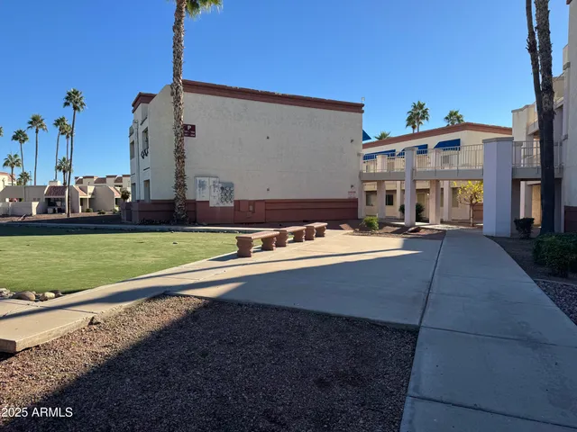 a view of a swimming pool with a house