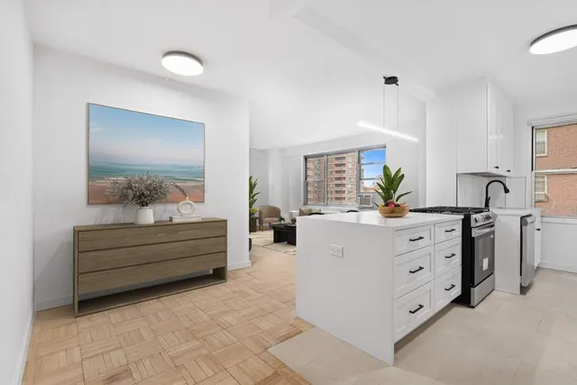 a view living room with furniture and window