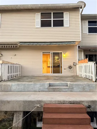 a kitchen with stainless steel appliances granite countertop a sink and a stove