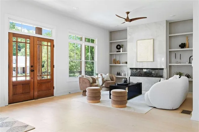 a living room with furniture and a window