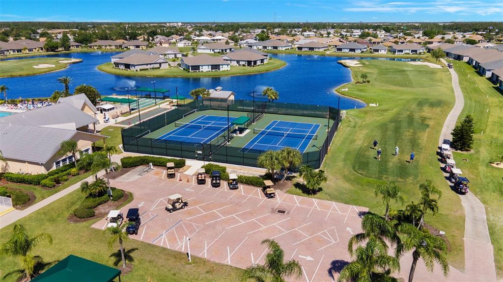 24504 Buckingham Way Punta Gorda, FL 33980 - Photo 27 of 42 an aerial view of a pool patio swimming pool and ocean view