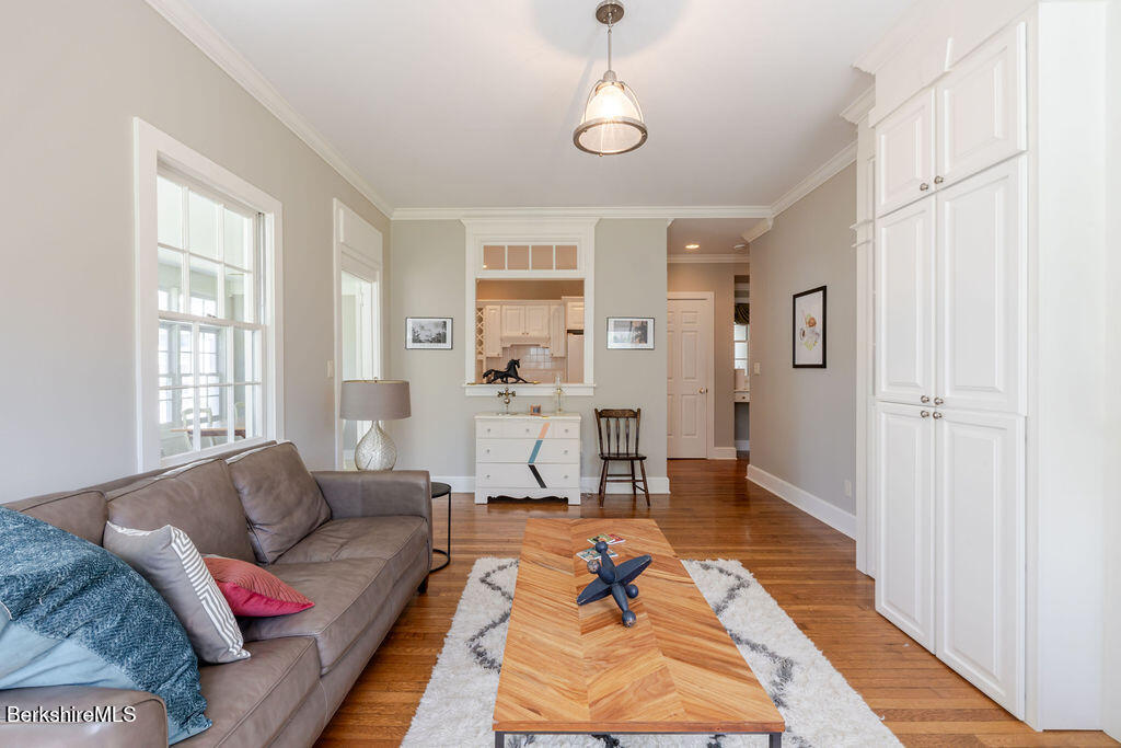 454 Main Road, Unit 2 Monterey, MA 01245 - Photo 12 of 30 a living room with furniture a rug and a window