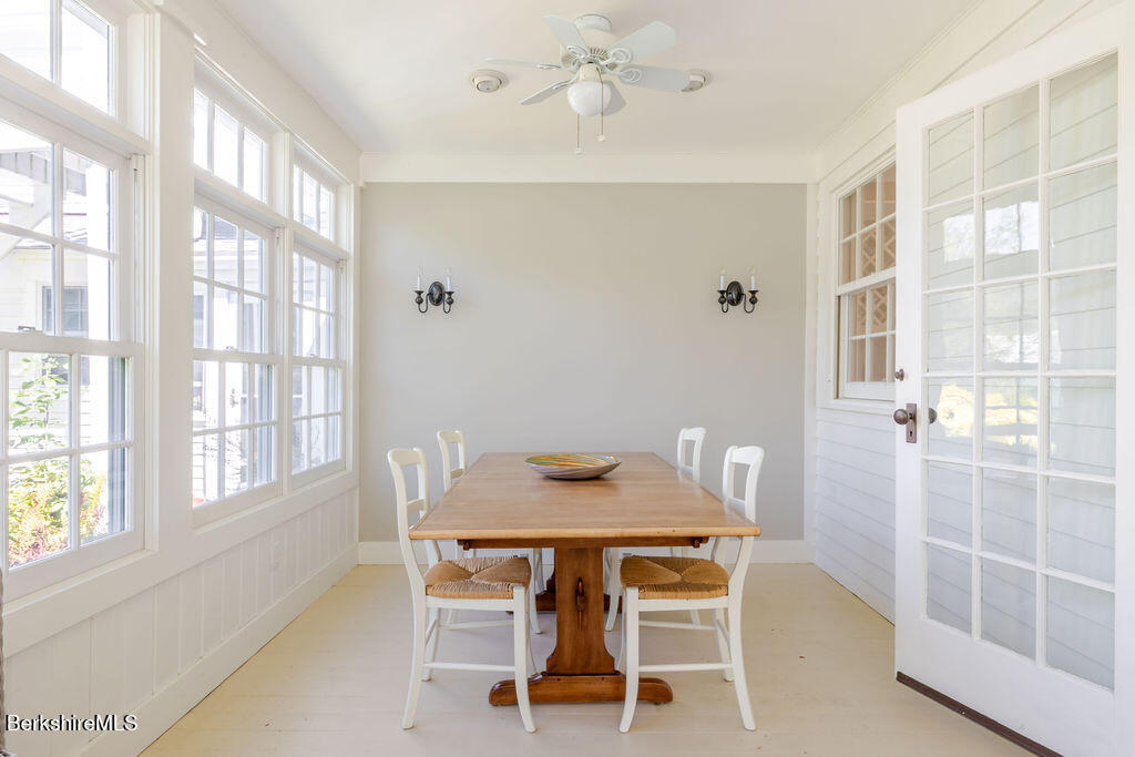 454 Main Road, Unit 2 Monterey, MA 01245 - Photo 16 of 30 a dining room with furniture and window