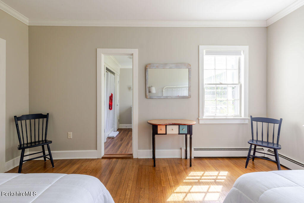 454 Main Road, Unit 2 Monterey, MA 01245 - Photo 23 of 30 a living room with furniture and a window