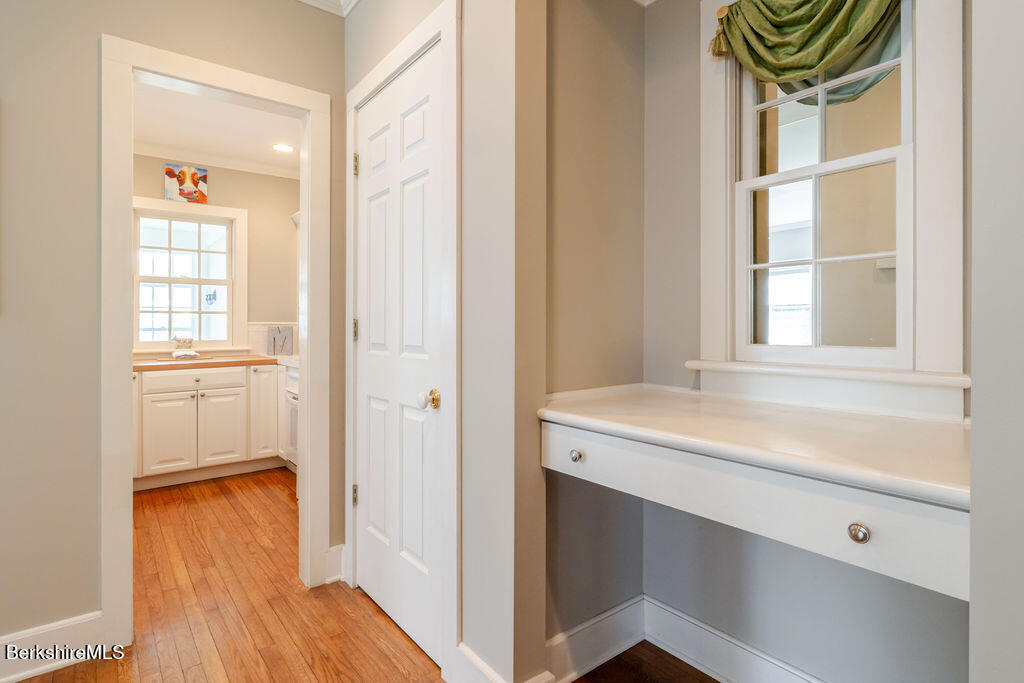 454 Main Road, Unit 2 Monterey, MA 01245 - Photo 8 of 30 a room with a window and wooden floor