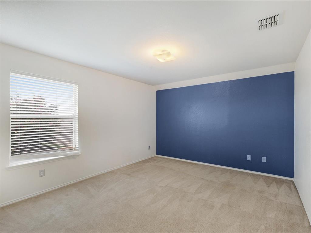2009 Cooper Ridge Lane Heartland, TX 75126 - Photo 25 of 40 a view of an empty room with a window