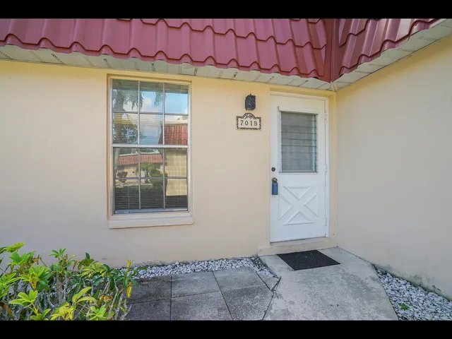 a front view of a house with entryway