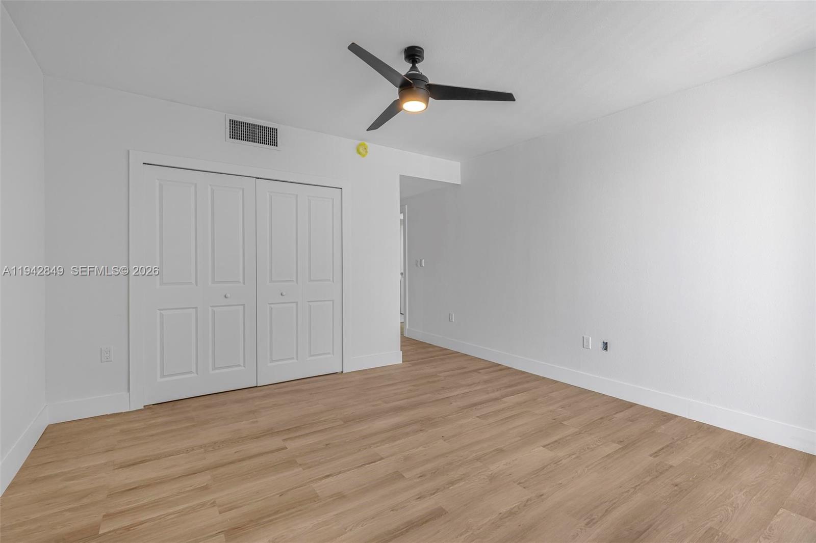 16955 Southwest 100th Avenue, Unit 9 Miami, FL 33157 - Photo 16 of 17 a view of an empty room