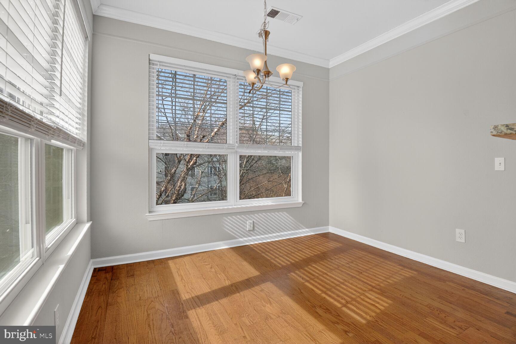 1600 Spring Gate Dr., Unit 2402 McLean, VA 22102 - Photo 11 of 33 Dining Room with plenty of bright natural light.