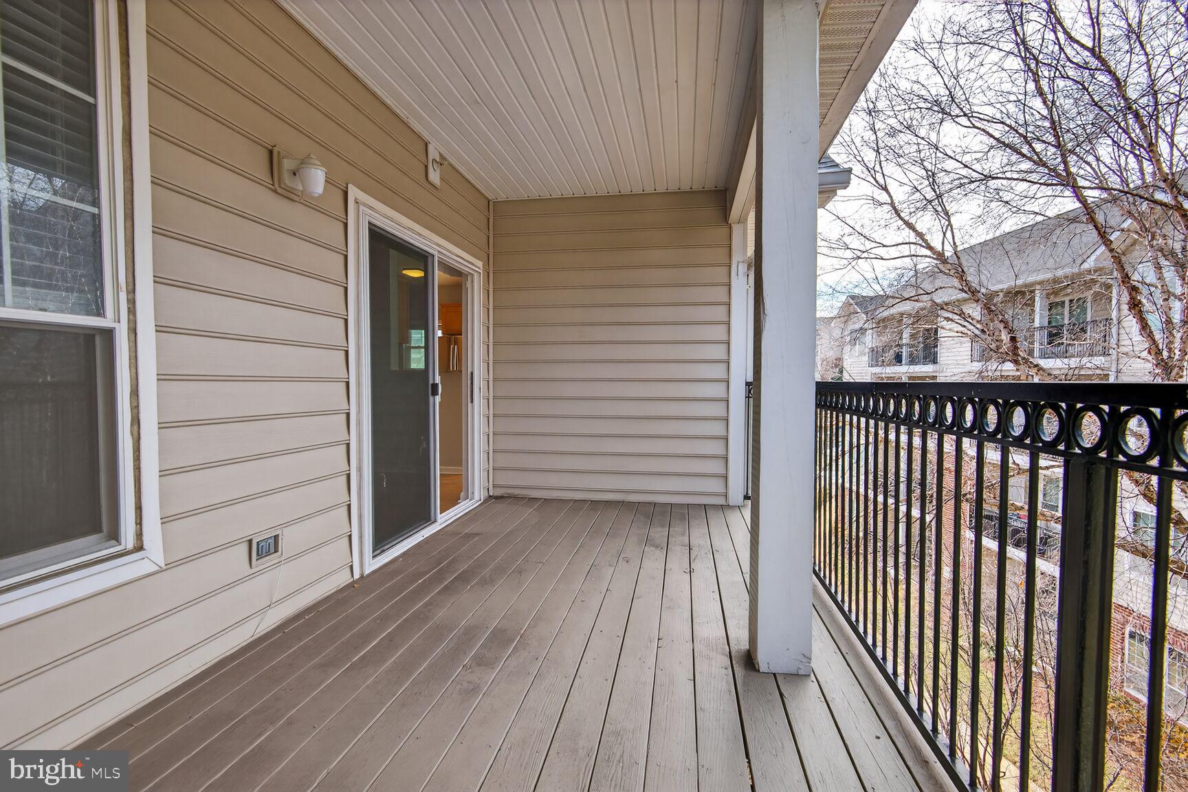 1600 Spring Gate Dr., Unit 2402 McLean, VA 22102 - Photo 20 of 33 Oversized patio overlooking treed courtyard