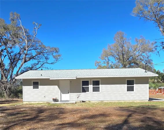 a front view of a house with a garage