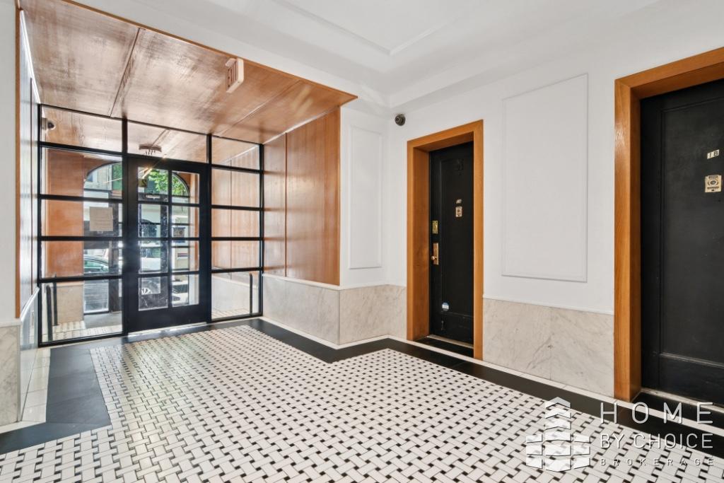 201 West 109th Street, Unit 6C Manhattan, NY 10025 - Photo 5 of 6 a bedroom with a bed and a window