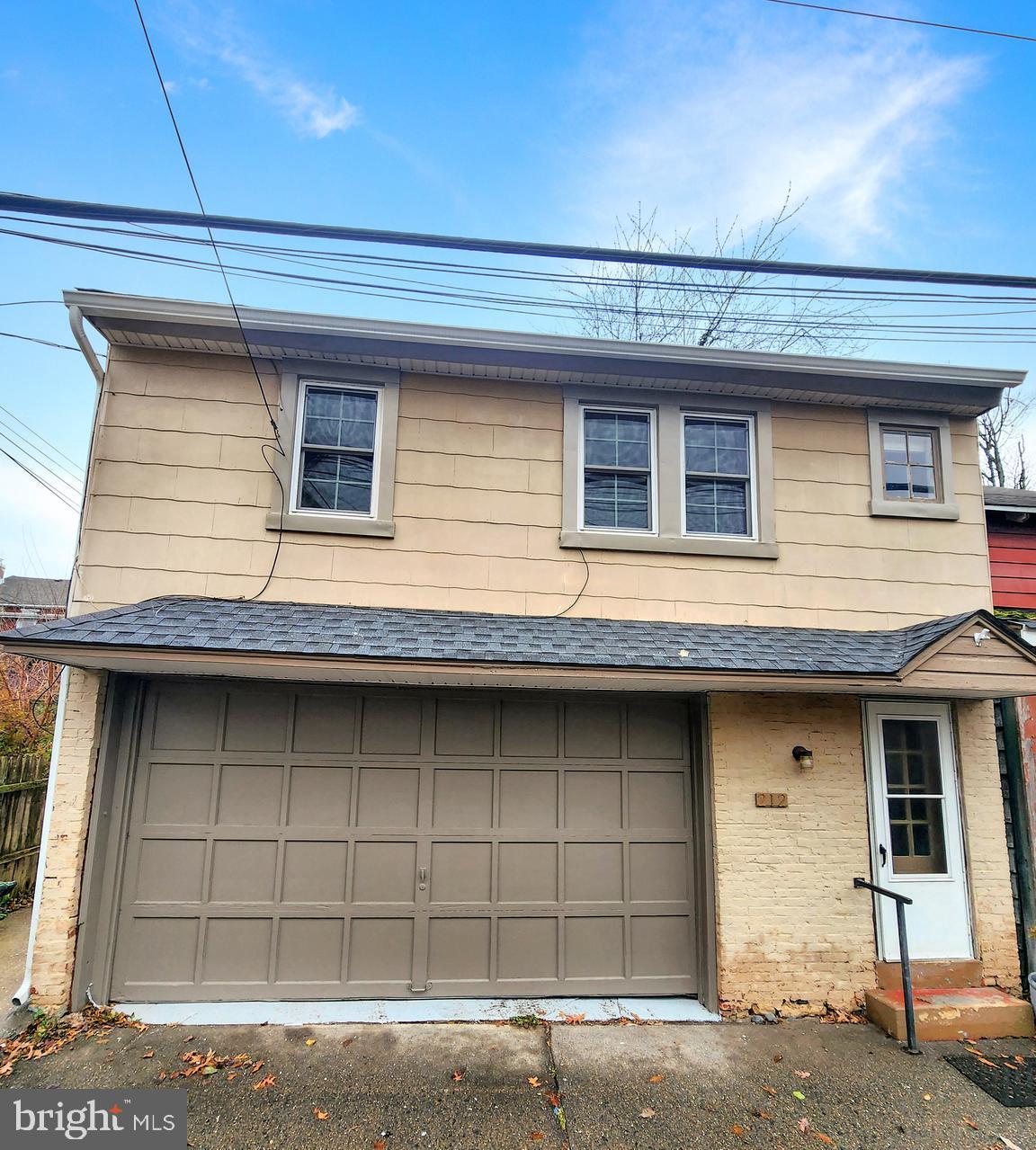 212 Jones Street Phoenixville, PA 19460 - Photo 1 of 17 a front view of a house
