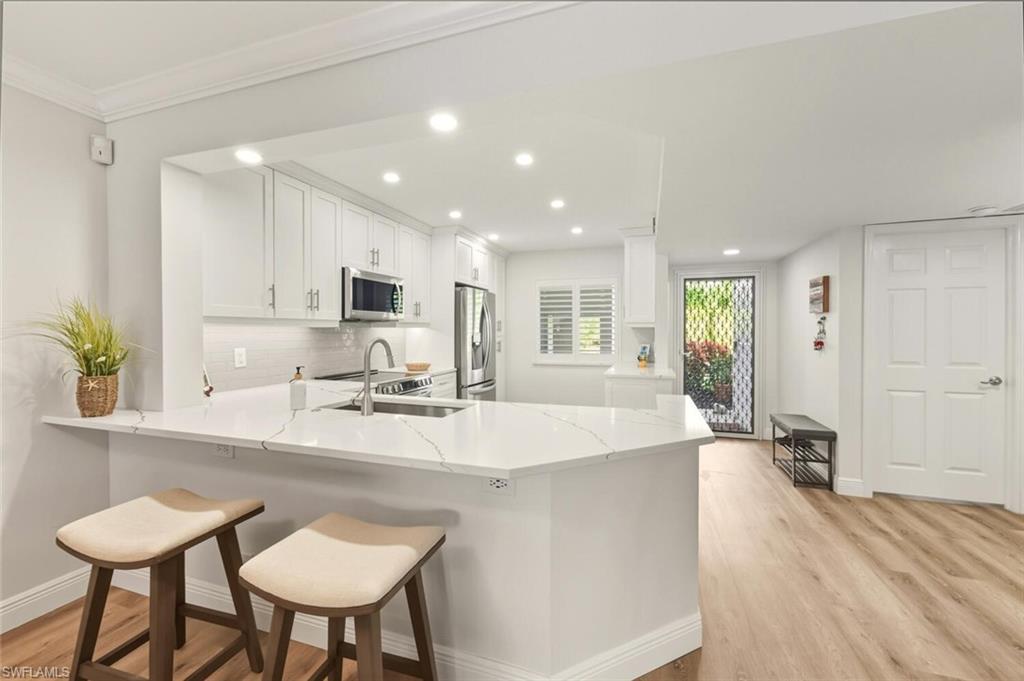 7772 Emerald Circle, Unit 101 Naples, FL 34109 - Photo 4 of 38