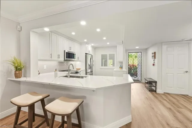 $369,900 | 7772 Emerald Circle, Unit 101, Naples, FL 34109