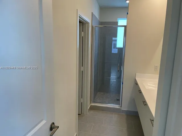 a bathroom with a sink and a bathtub